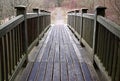 Wooden bridge into rural countryside Royalty Free Stock Photo