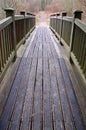 Wooden bridge into rural countryside Royalty Free Stock Photo