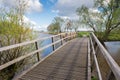 Wooden bridge on a sunny day in springtime Royalty Free Stock Photo