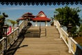 A wooden bridge to the pavilion. Royalty Free Stock Photo