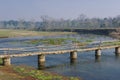 Wooden bridge in village in Nepal A bridge across the River Rapti, in the Chitwan National Park. Nepal Royalty Free Stock Photo