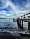 wooden bridge where fishing boats dock on lovina beach Royalty Free Stock Photo