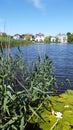 White Lotus And Blue Lake Blue Sky With Waterfront Residence