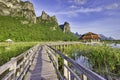 Wooden bridges and small pavilions with mountain views. There is a blue sky in the evening at Lotus Pond is a national park in Sam