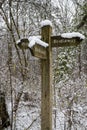 Wooden bridleway sign in the snow