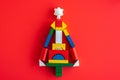 Wooden bright geometric shapes, Creative christmas tree Royalty Free Stock Photo