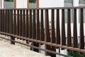 Wooden brown fence near modern building outdoors
