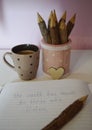 Wooden brown handmade jar with wooden pencils