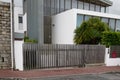 Wooden brown natural modern gate of private house building