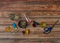 Wooden brown table with alcohol bottles and glasses and marijuana ashtray Royalty Free Stock Photo