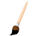 Wooden brush with black paint.