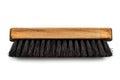 Wooden brush for cleaning clothes on a white background. Royalty Free Stock Photo