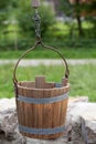 Wooden bucket of an antique draw well Royalty Free Stock Photo