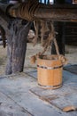 Wooden bucket on the groundwater well