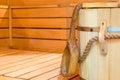 Wooden bucket and ladle in sauna Royalty Free Stock Photo