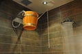 Wooden bucket in shower