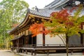 Wooden Buddhist Temple with traditional wooden carved roof and golden ornaments  in Kyoto, Japan. Royalty Free Stock Photo