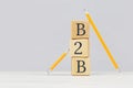 Wooden building blocks with the abbreviation acronym B2B