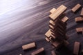 Wooden building blocks tower on wooden background top view with Royalty Free Stock Photo