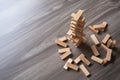 Wooden building blocks tower on wooden background top view with Royalty Free Stock Photo