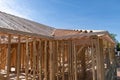 Wooden building in blue sky,New residential construction home framing. Royalty Free Stock Photo