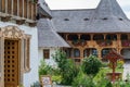 Wooden buildings in the courtyard of Barsana Monastery, Maramures, Romania Royalty Free Stock Photo