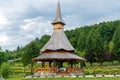 Wooden buildings in the courtyard of Barsana Monastery, Maramures, Romania Royalty Free Stock Photo