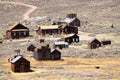 Bodie State Historic Park with Abandonned Houses in Ghost Town surrounded by Desert Landscape, California Royalty Free Stock Photo