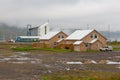 Wooden buildings in the port city of Seydisfjordur located by the fjord, Iceland