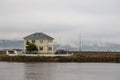 Wooden buildings in the port city of Seydisfjordur located by the fjord, Iceland