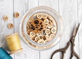 Wooden buttons in the jar