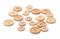 Wooden buttons on white surface