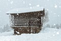 Wooden cabin in the austrian alps, covered with snow Royalty Free Stock Photo