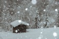 Wooden cabin in the austrian alps, covered with snow Royalty Free Stock Photo