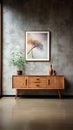 A wooden cabinet with a framed picture of a tree on it Royalty Free Stock Photo
