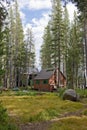 Wooden cabins in forest Royalty Free Stock Photo