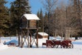 A Wooden Cache and Old Wagon Royalty Free Stock Photo