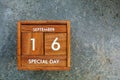 Wooden calendar on September 16 .World ozone day.