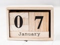 Wooden calendar that shows seventh of january