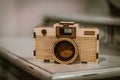 Wooden Camera Sitting on Desk