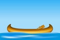 Wooden canoe with paddles floating on water Royalty Free Stock Photo