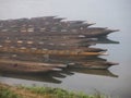 Wooden canoe on the river. misty morning Royalty Free Stock Photo