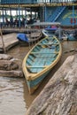 Wooden canoe in river port Royalty Free Stock Photo