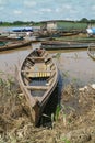 Wooden canoe in river port Royalty Free Stock Photo