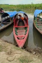 Wooden canoe in river port Royalty Free Stock Photo