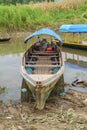 Wooden canoe in river port Royalty Free Stock Photo