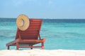 Wooden canvas chair on a beautiful tropical beach Royalty Free Stock Photo