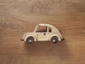 Wooden car toy with curvy shape