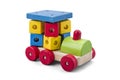 Wooden car - truck toy with colorful blocks isolated over white with clipping path Royalty Free Stock Photo