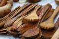 Wooden carved natural utensils on market stall